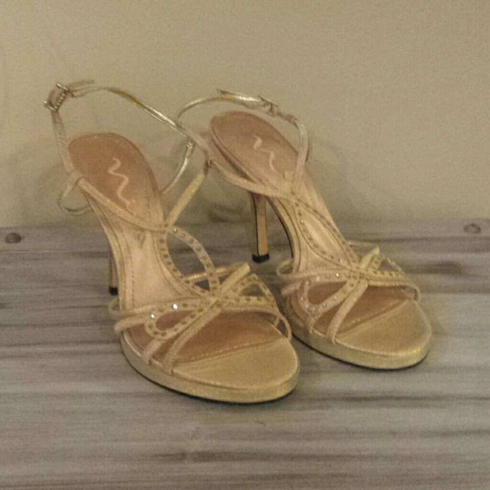 Gold strappy heels